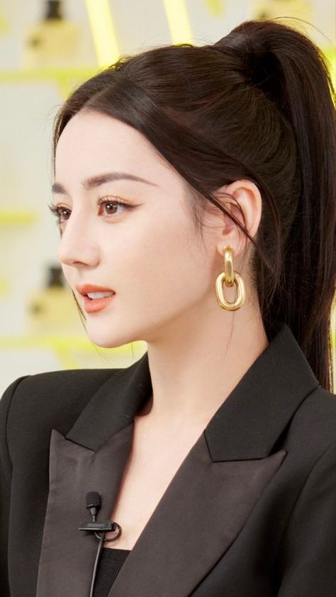 This contains an image of Dilraba Dilmurat 