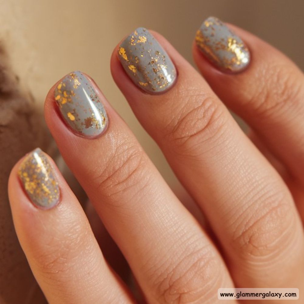 Winter Gray Nails having Luxurious Gray with Gold Flakes
