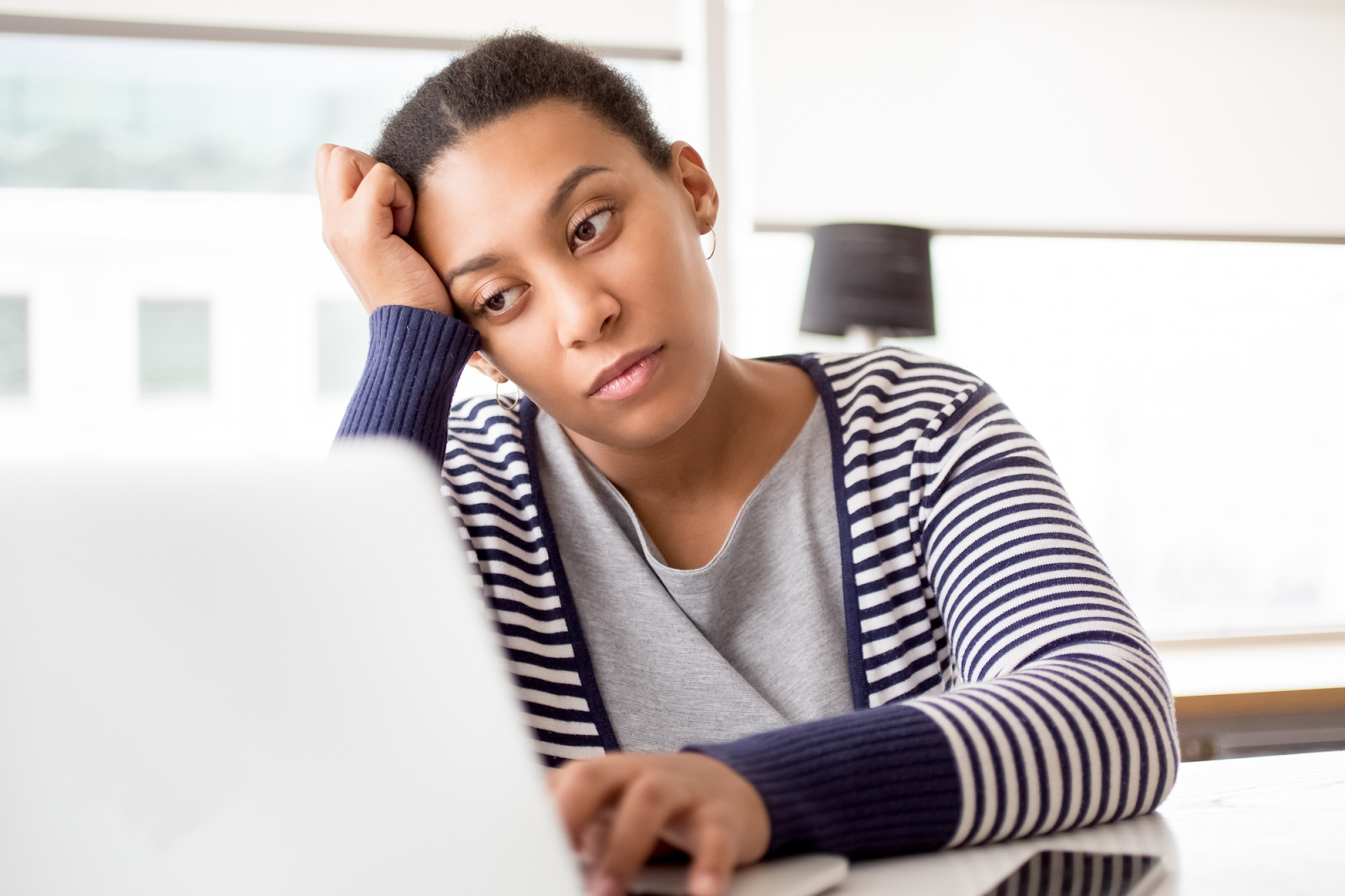 Lady worried about her credit score dropping by 100 points.