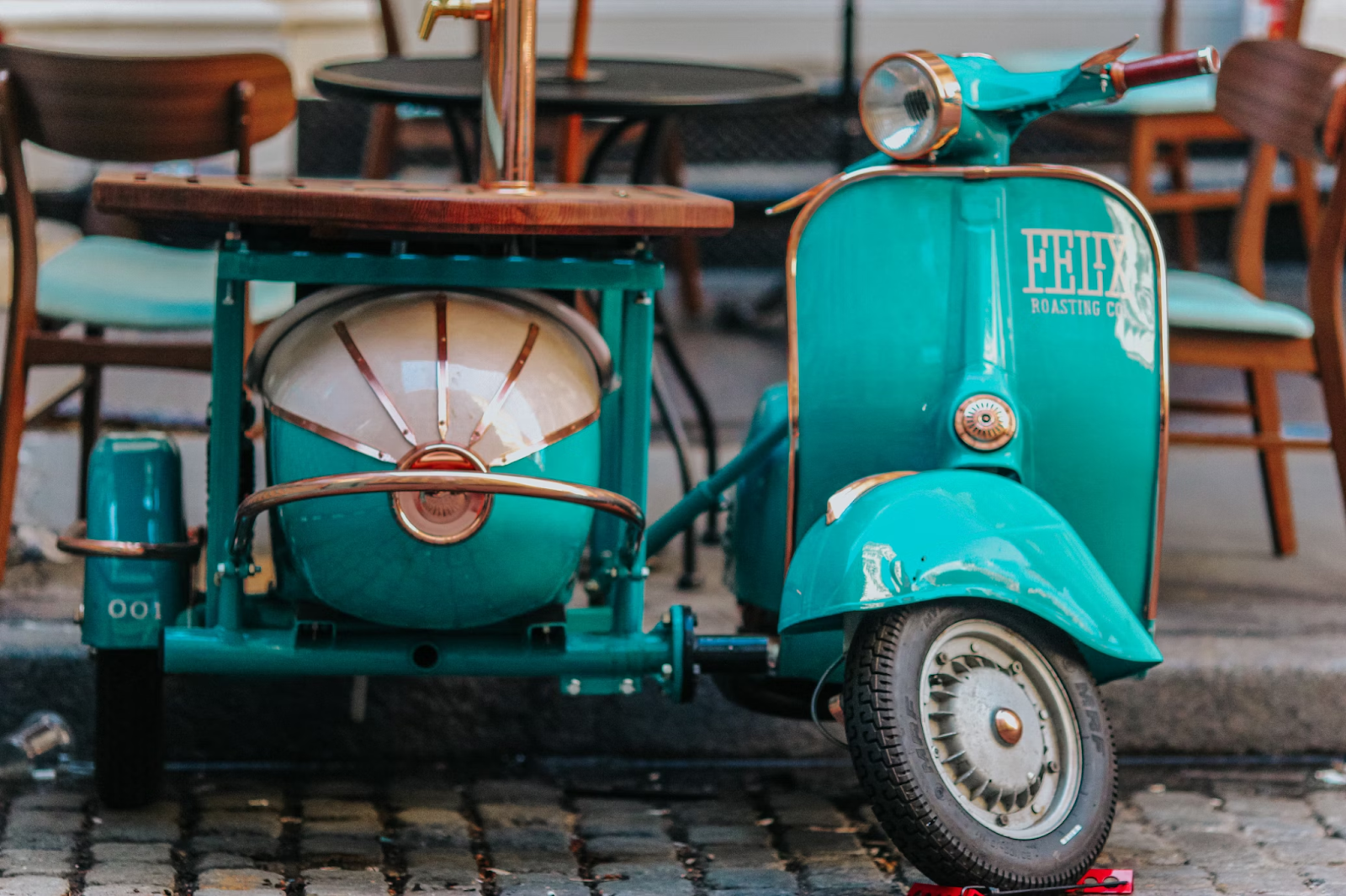 Image expression of old Vespa with a side car as Dapr + Microcks: Sidecars, Mocks and Contract Testing For The Win!