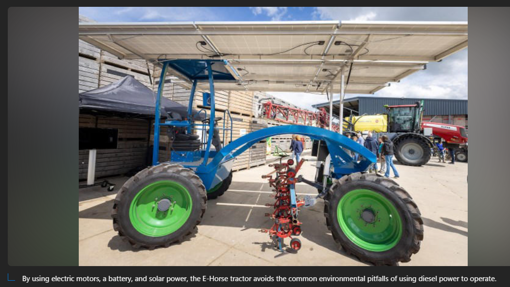 A blue and green tractor with green wheels

Description automatically generated