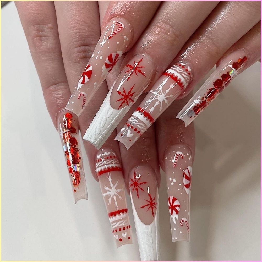 Close up of hands having Christmas red nails with Candy Cane Red Coffin Nails