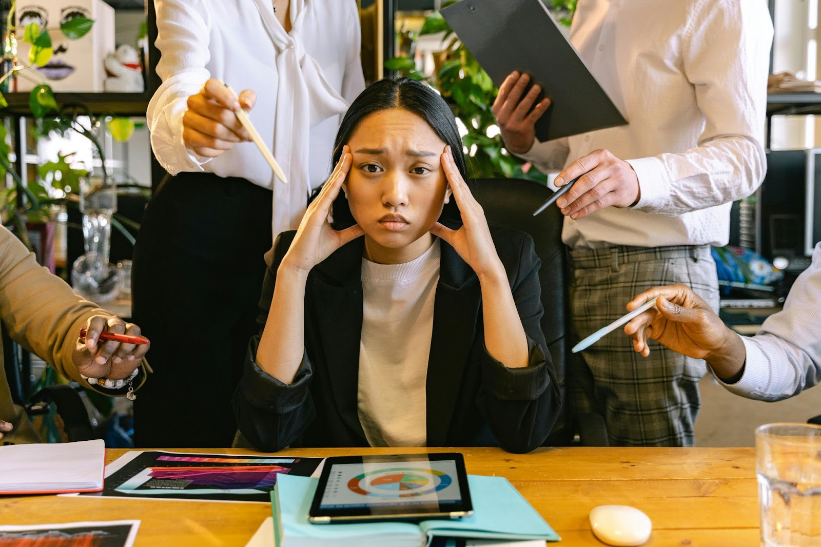 A woman overwhelmed by everything around her