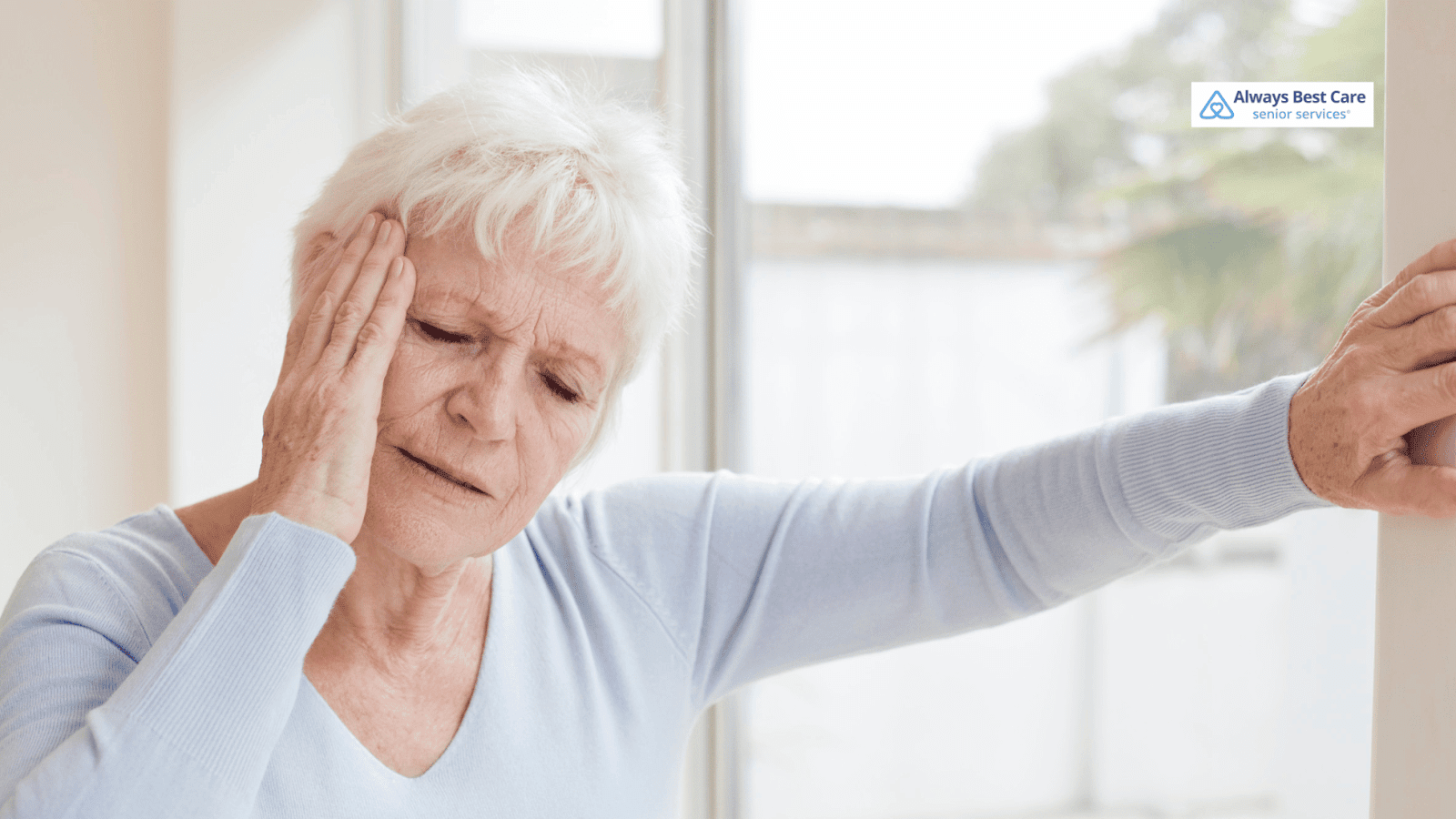 This image depicts a senior woman experiencing dizziness due to medication side effects