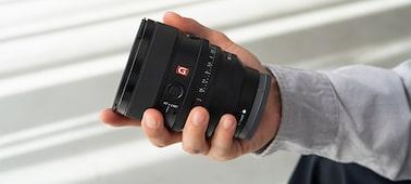 The FE 85mm F1.4 GM II fits comfortably in the palm of a hand.