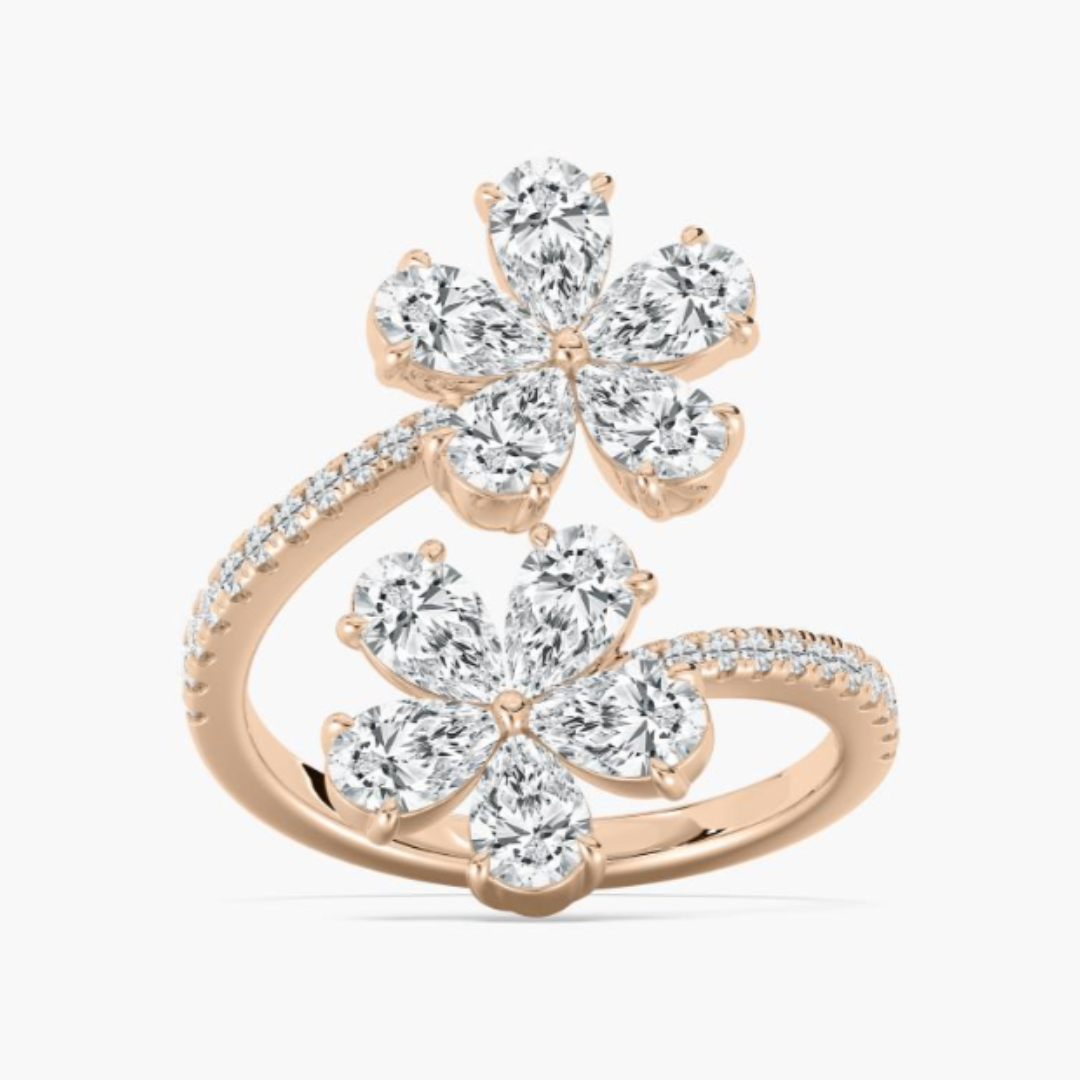Pear cut lab-grown diamond floral engagement ring for woman.