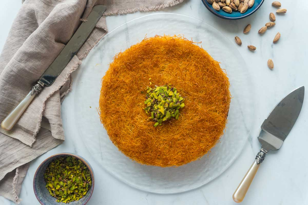 Kunafa Topped with Pistachio on a Plate - (Credits Chocolates & Chai)
