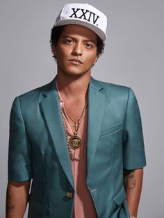 This contain an image of Bruno Mars  in his 14-year career