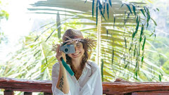Woman Photographing in Tropical Resort starts June 23, 2025 at 09:00PM