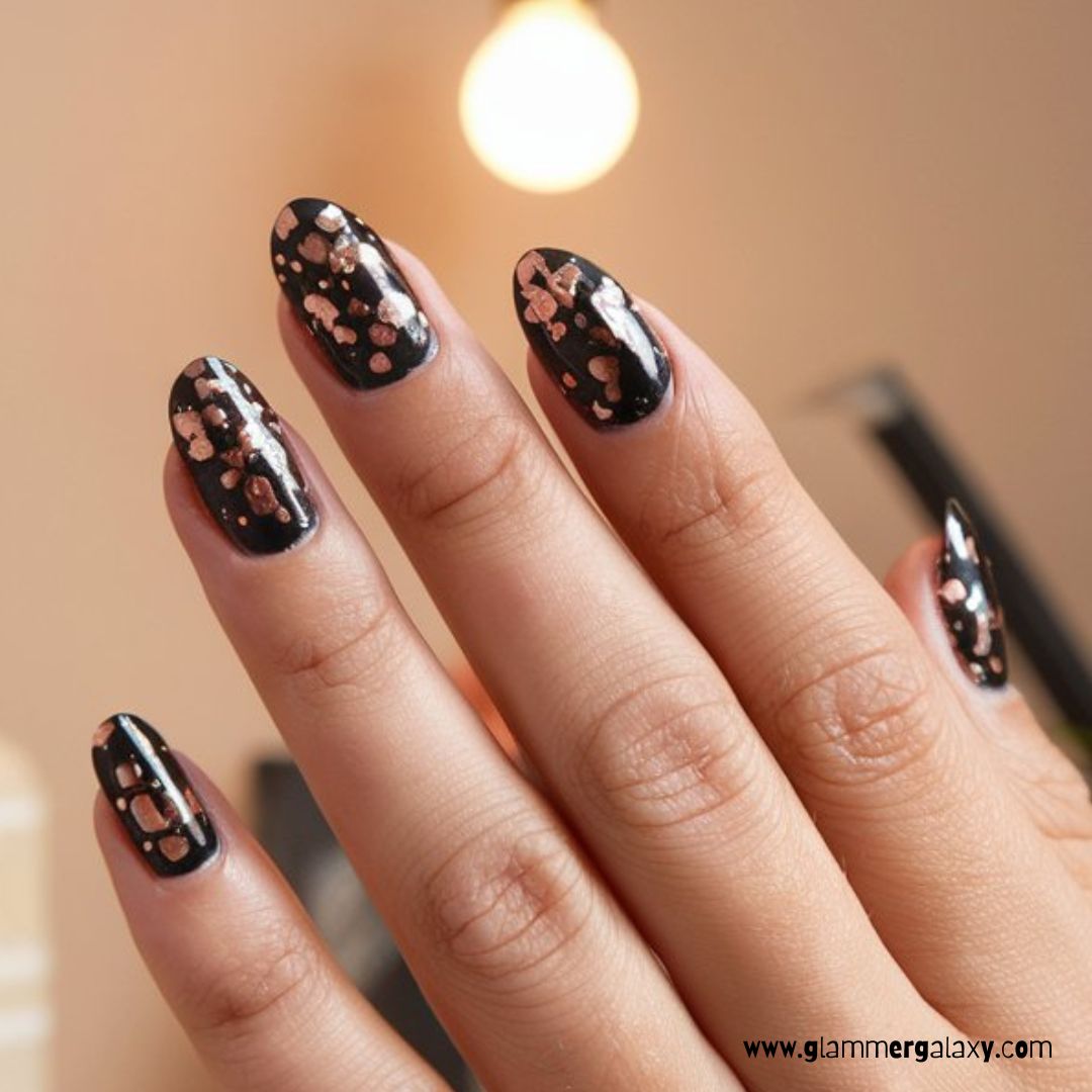 Black and Rose Gold Nail Designs having Black Nails with Rose Gold Flecks
