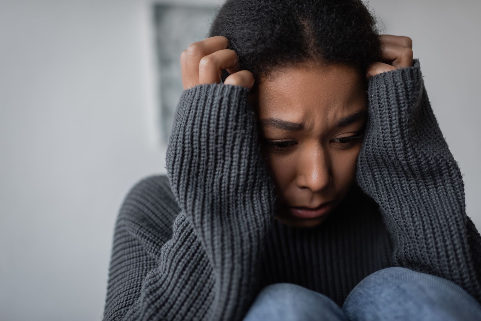 LifeUP Health Coaching LLC - Helping parents get healthy through diet, exercise and sleep. Sad girl holding head.