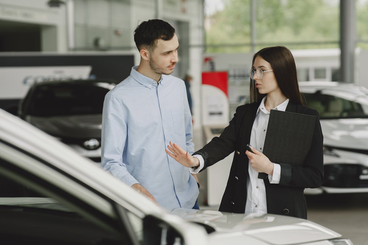 A woman selling the best car to buy in Singapore.