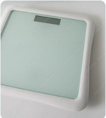 A white scale on a white surface

Description automatically generated