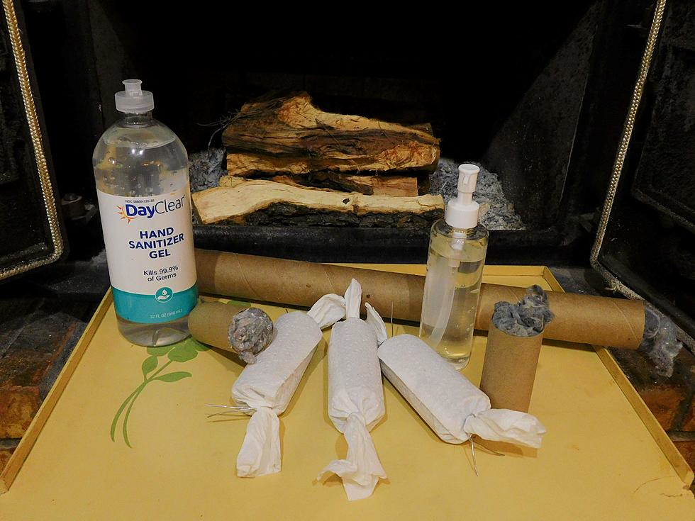 A display of a hand Sanitizer, woods, foil, brown paper to be used for fire settings as a Survival Hacks Using Common Household Items for Camping