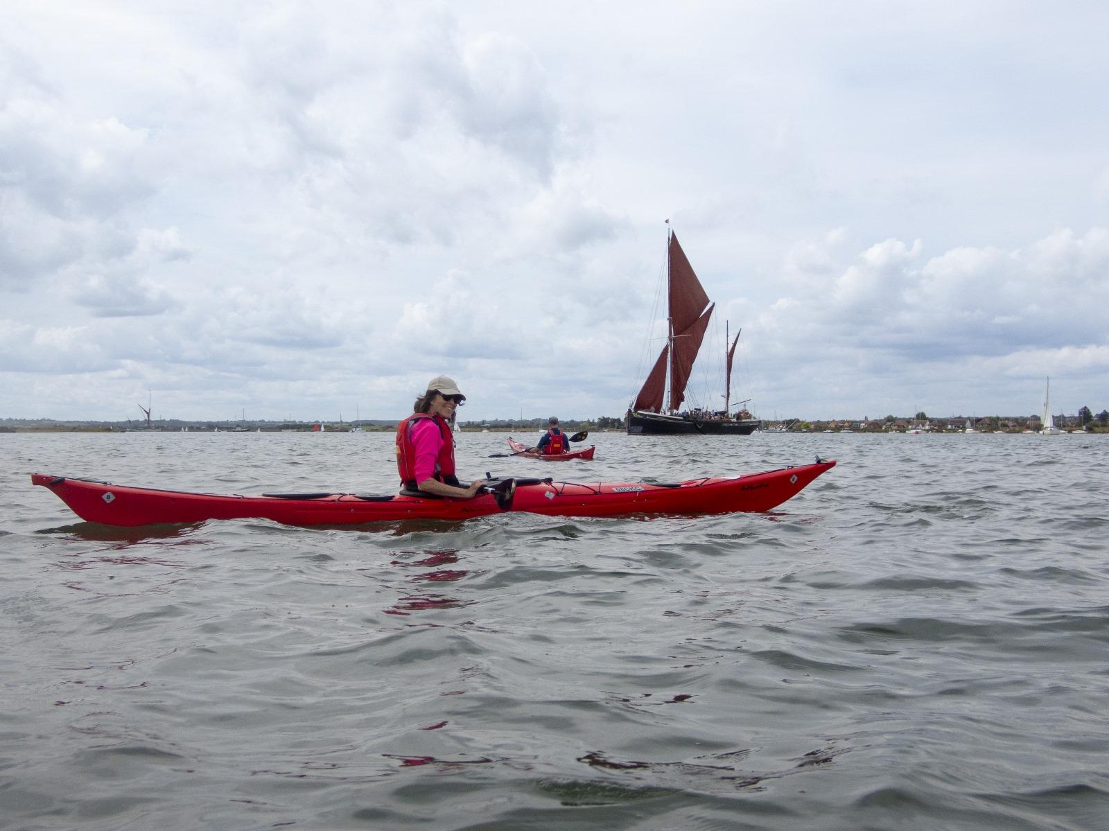 A person in a red kayak

Description automatically generated