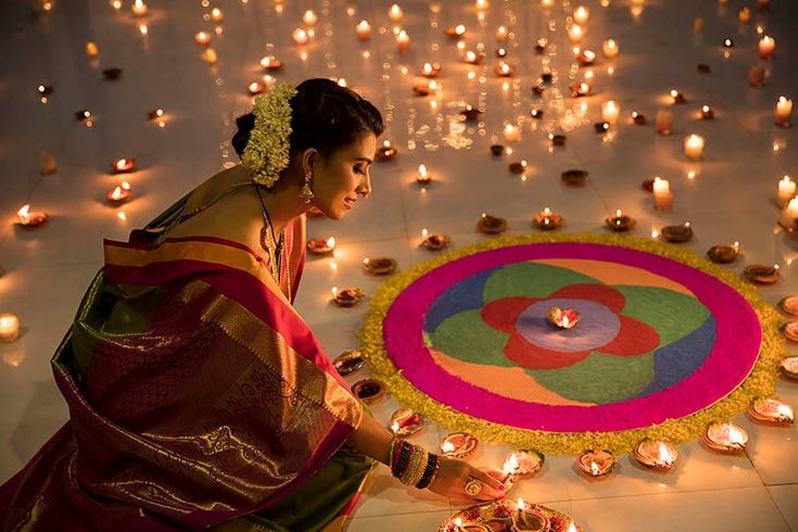 Rangoli-making moments captured for an enchanting indoor Diwali photoshoot