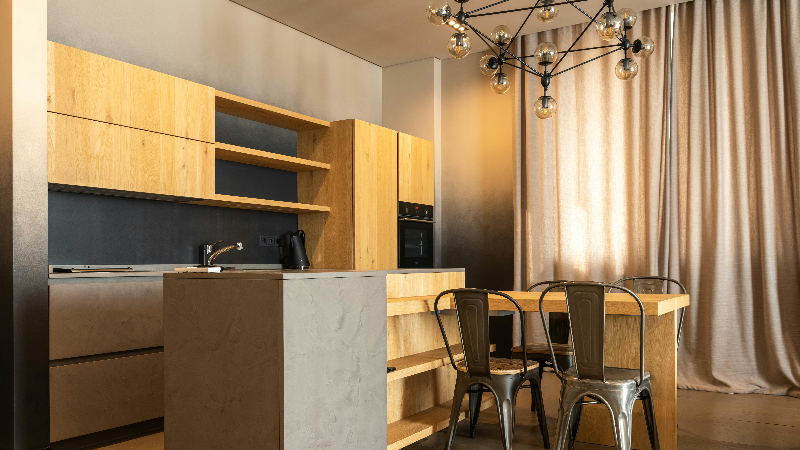 A fancy chandelier above a connected table