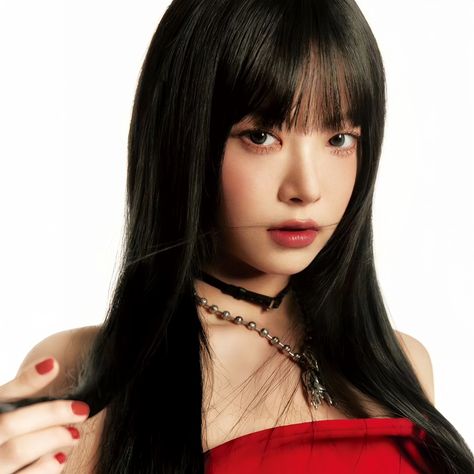 This contains an image of Eunchae with a long black hair wearing a red dress