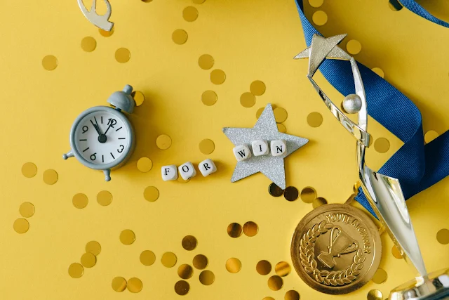 a medal surrounded by trinkets