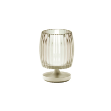 A glass cup on a white background

Description automatically generated