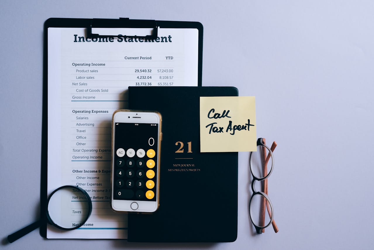 A close-up of a calculator app on a smartphone, designed to assist users in managing their tax returns effortlessly.