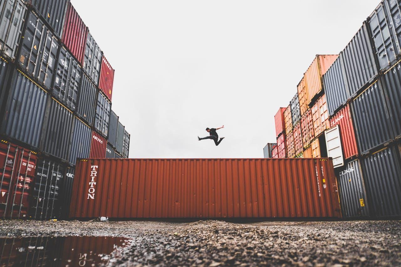 Man jumping on an intermodal container