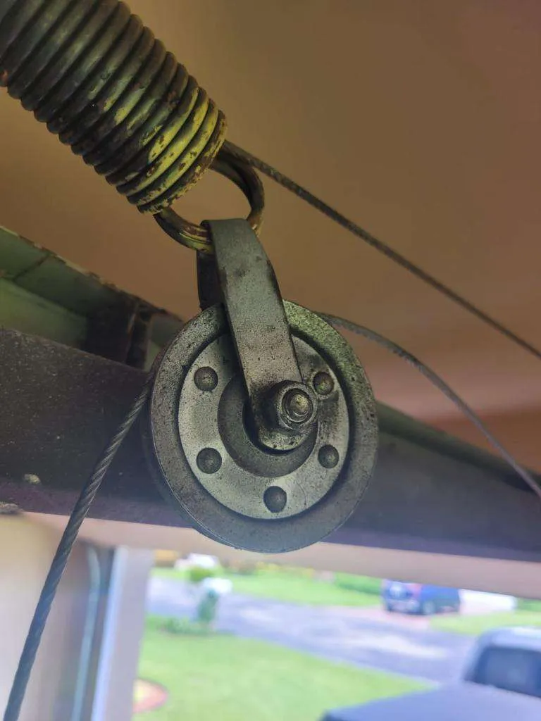 how to replace garage door spring