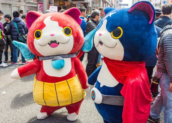 Two Yo-kai Watch cosplayers at Nipponbashi Street Festa in Osaka