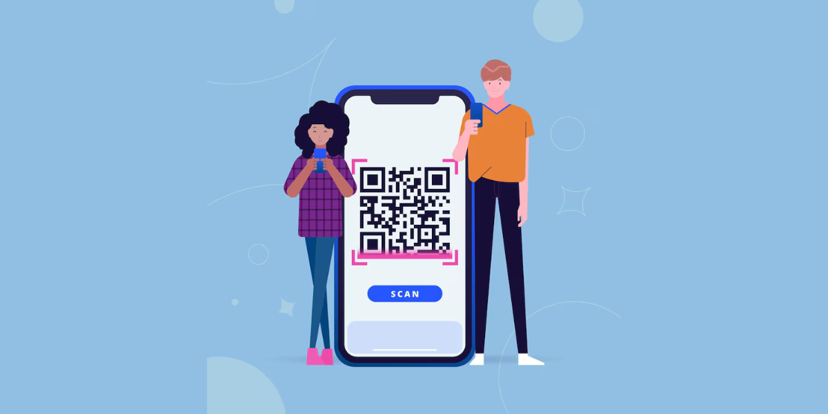 a man and a woman on their phone standing near a giant phone with a QR