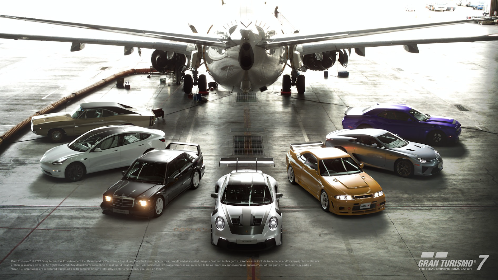  Screenshot of cars in an airplane hanger in Gran Turismo 7.