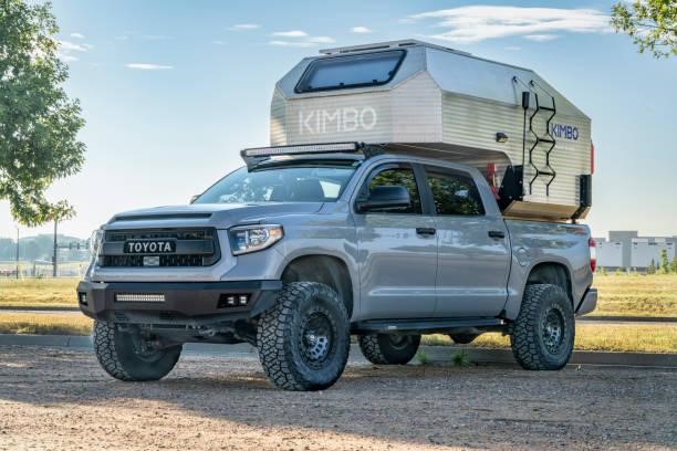 Kimbo aluminum camper on Toyota Tacoma truck. Loveland, CO, USA - August 27, 2023: Kimbo aluminum camper on Toyota Tacoma truck. Toyota Tacoma Roof rack  stock pictures, royalty-free photos & images