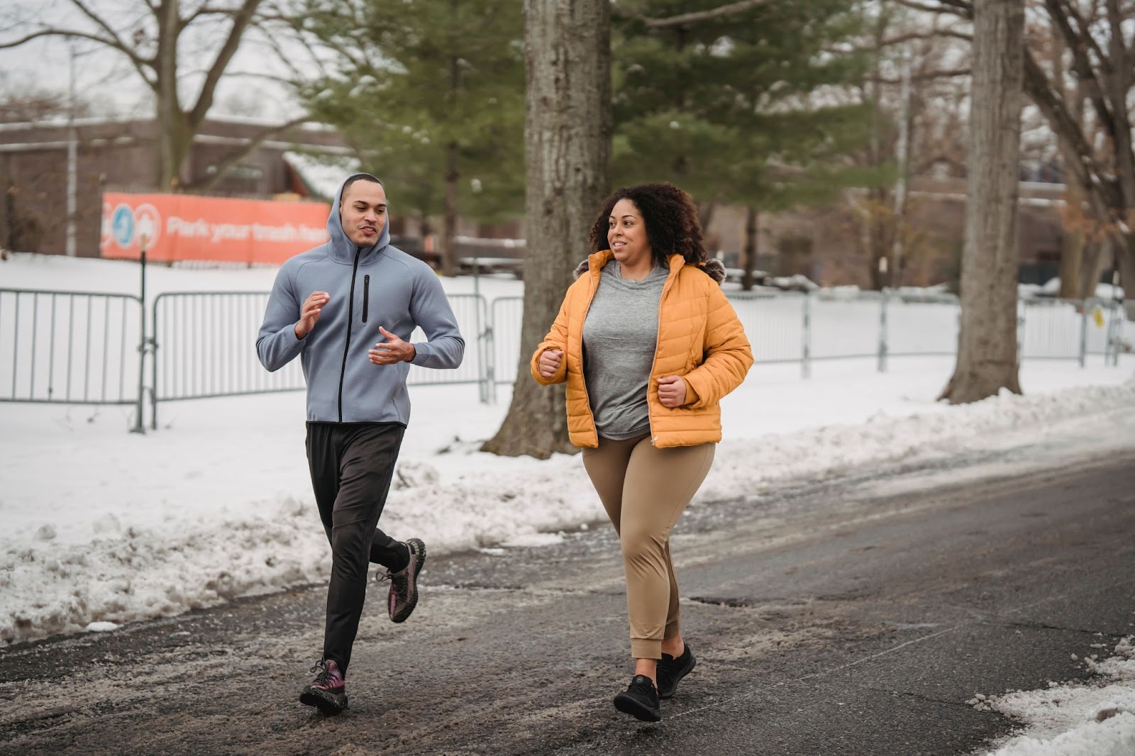 two friends jogging together