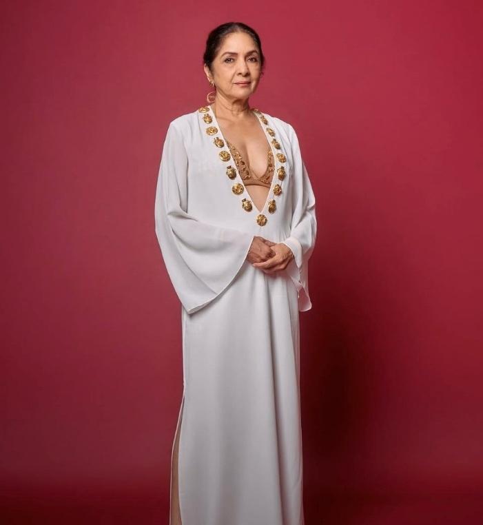 A person in a white dress

AI-generated content may be incorrect.