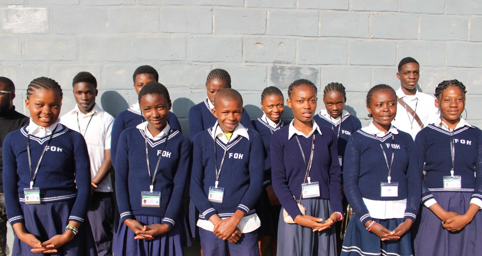 A group of students in uniform

Description automatically generated