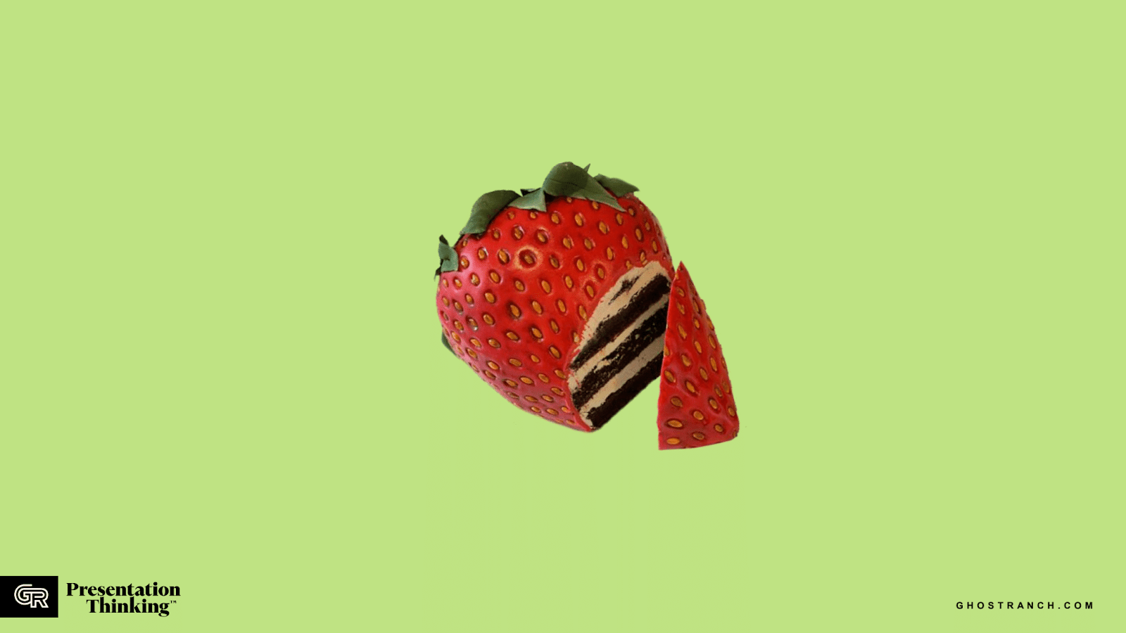 Same picture of a strawberry, but sliced so you can see that it's not a strawberry but a a layer cake decorated to look like a strawberry.