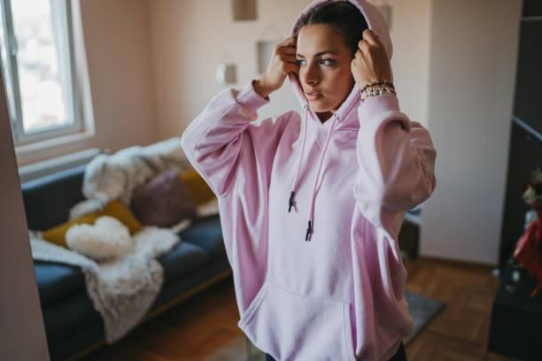 Getting ready to go out Getting ready to go out sweatshirts stock pictures, royalty-free photos & images