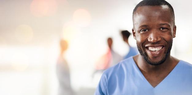 Premium Photo | Black man doctor and portrait in clinic with space for  mockup healthcare and wellness with bokeh Happy African medic excited and  pride for job in hospital surgery and nursing