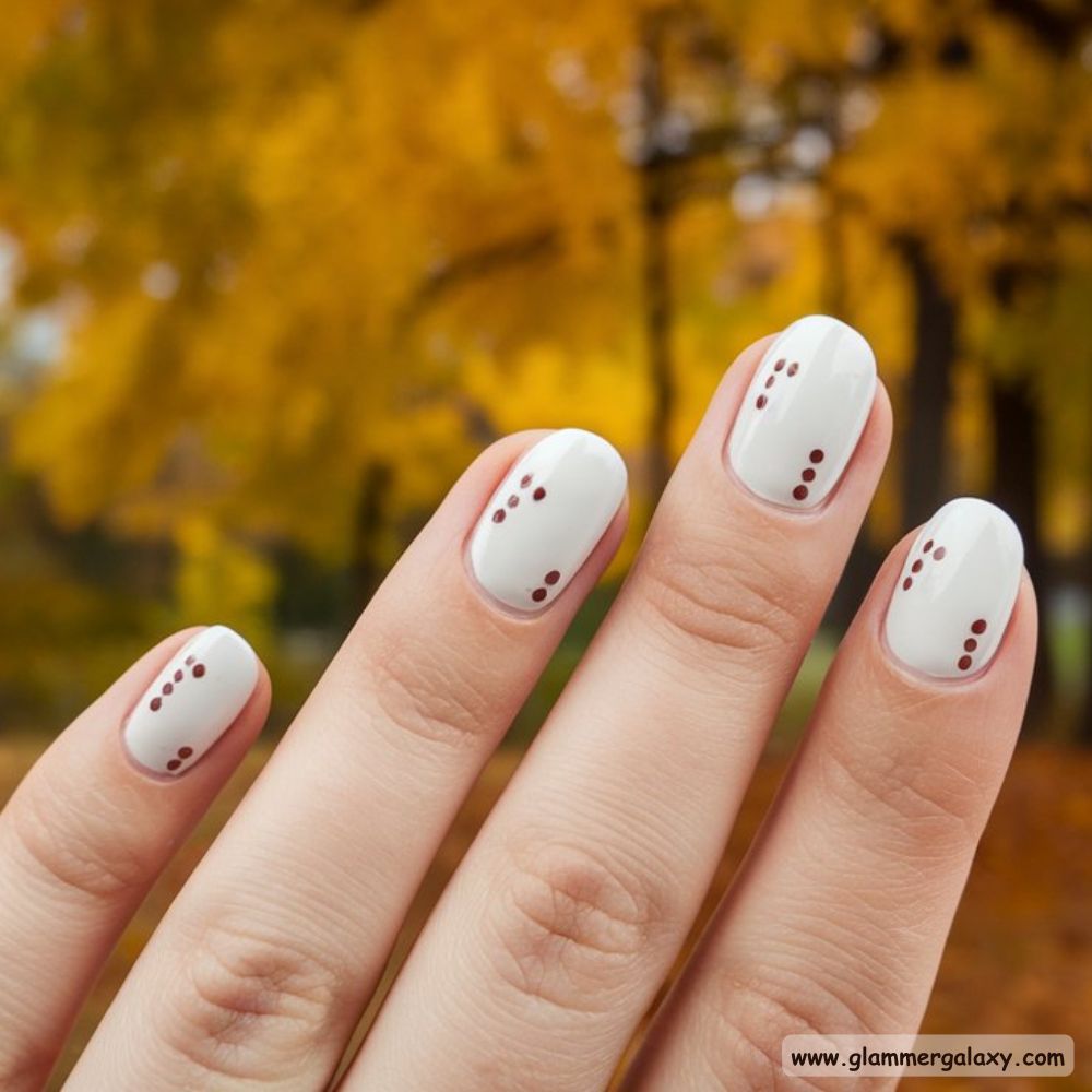 White Fall Nails having Minimalist Dot Patterns
