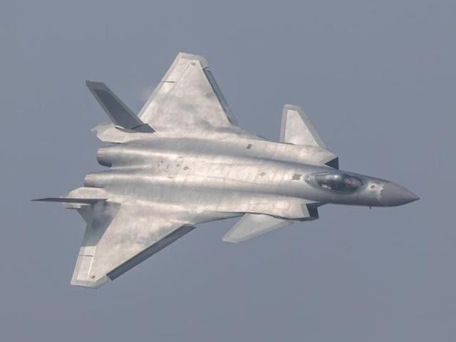 China unveiled its secretive J-20 stealth fighter at the air show in Zhuhai, Guangdong Province.(Reuters Photo)