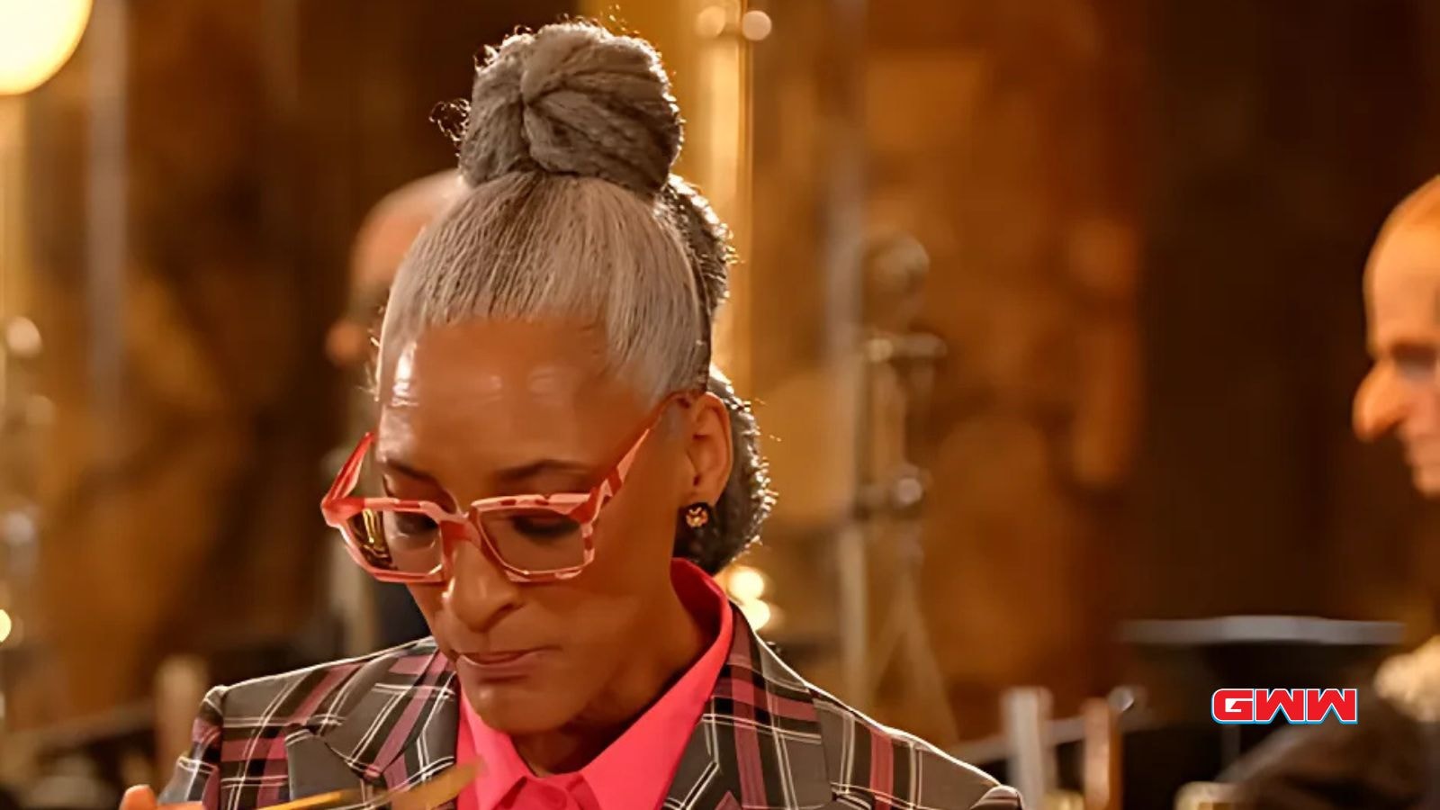 Carla Hall judging a dish in Harry Potter Wizards of Baking show