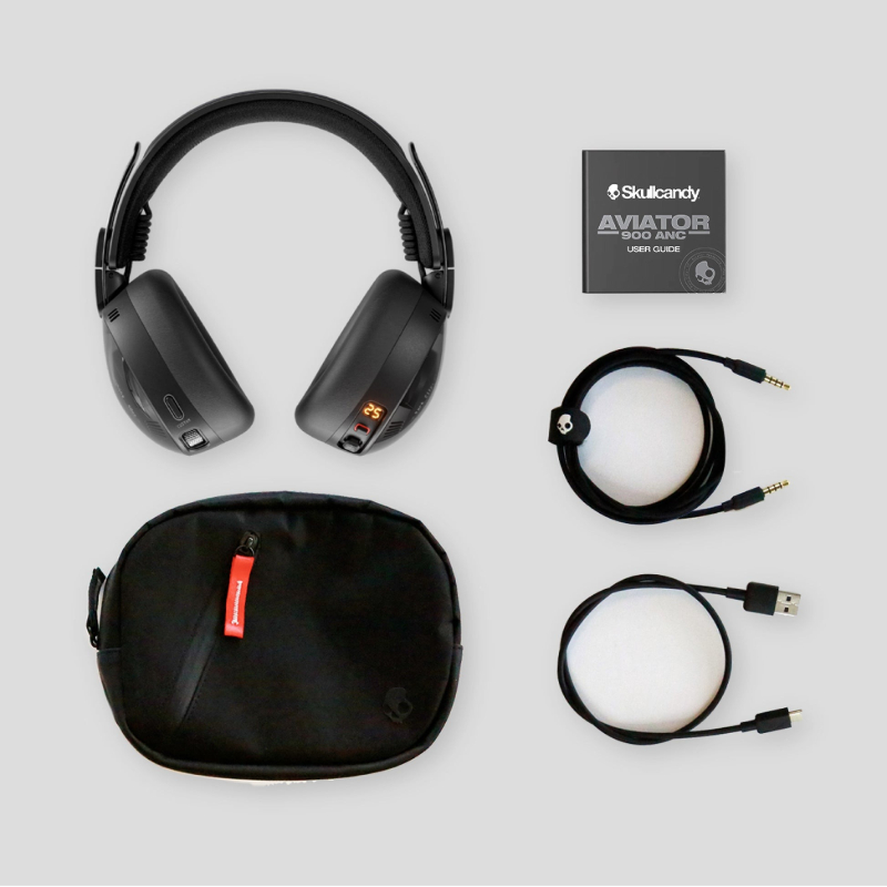 Skullcandy Aviator 900 ANC headphones with charging cable and AUX cable.