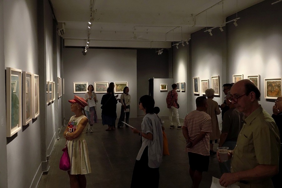 Tourists eagerly visit an art exhibition