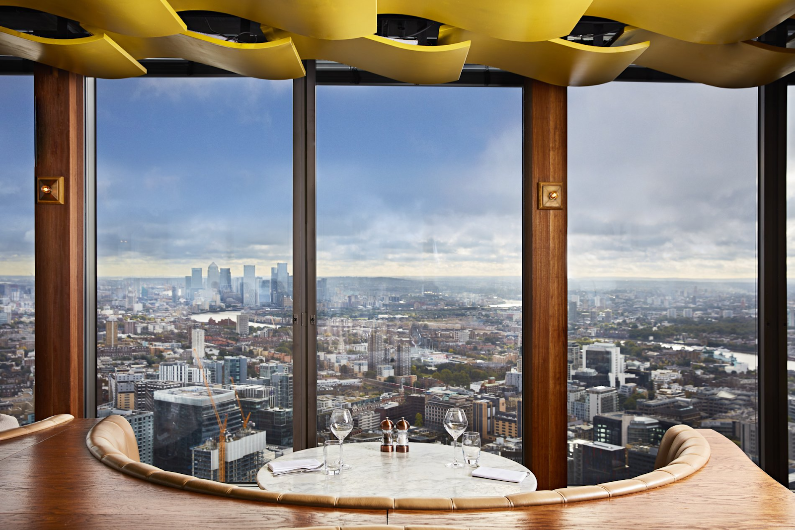 seating area with the city view in duck and waffle restaurant