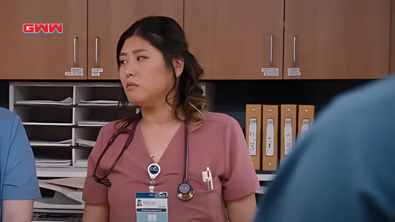 Kahyun Kim appears concerned in hospital supply area