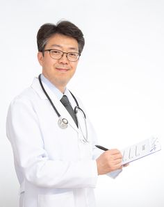 This  contain an image male doctor in a white lab coat holding a clipboard with writing on it