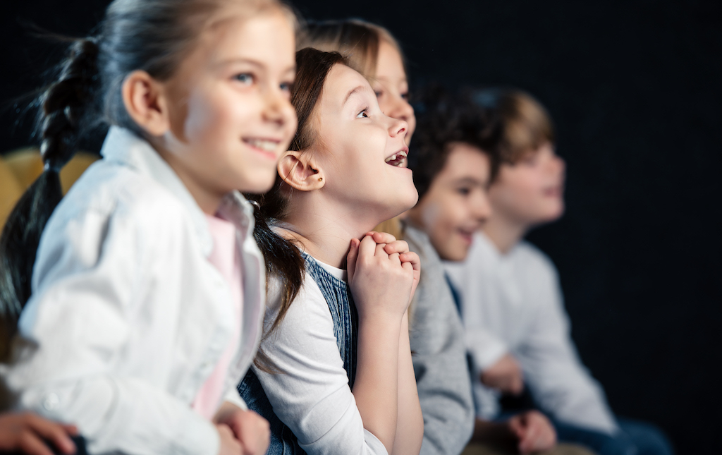 Kids watching movies during a movie marathon event