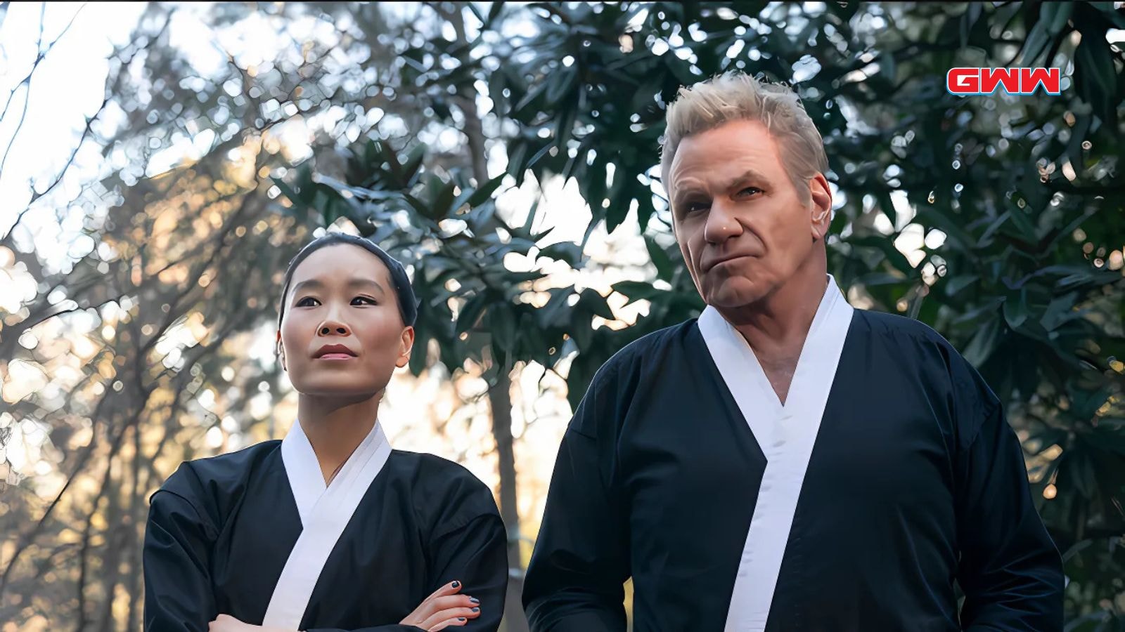 Alicia Hannah-Kim as Kim Da-Eun and Martin Kove as John Kreese in Cobra Kai Season 6