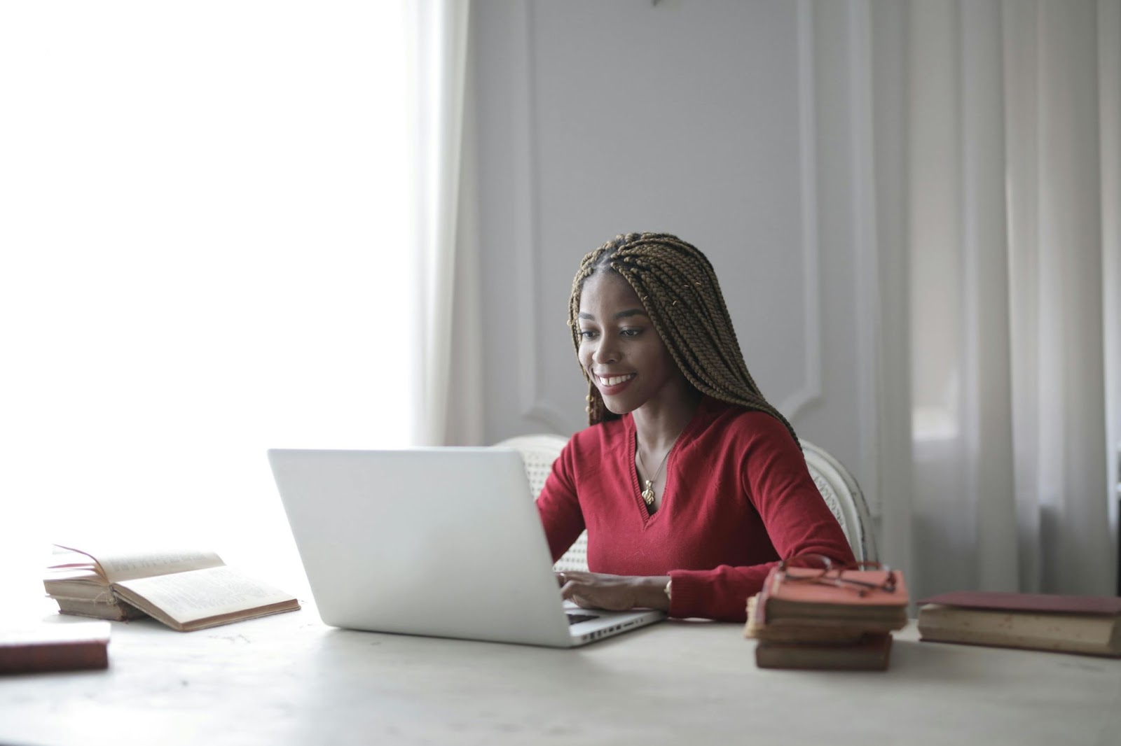 image of a lady reading engaging content from a laptop