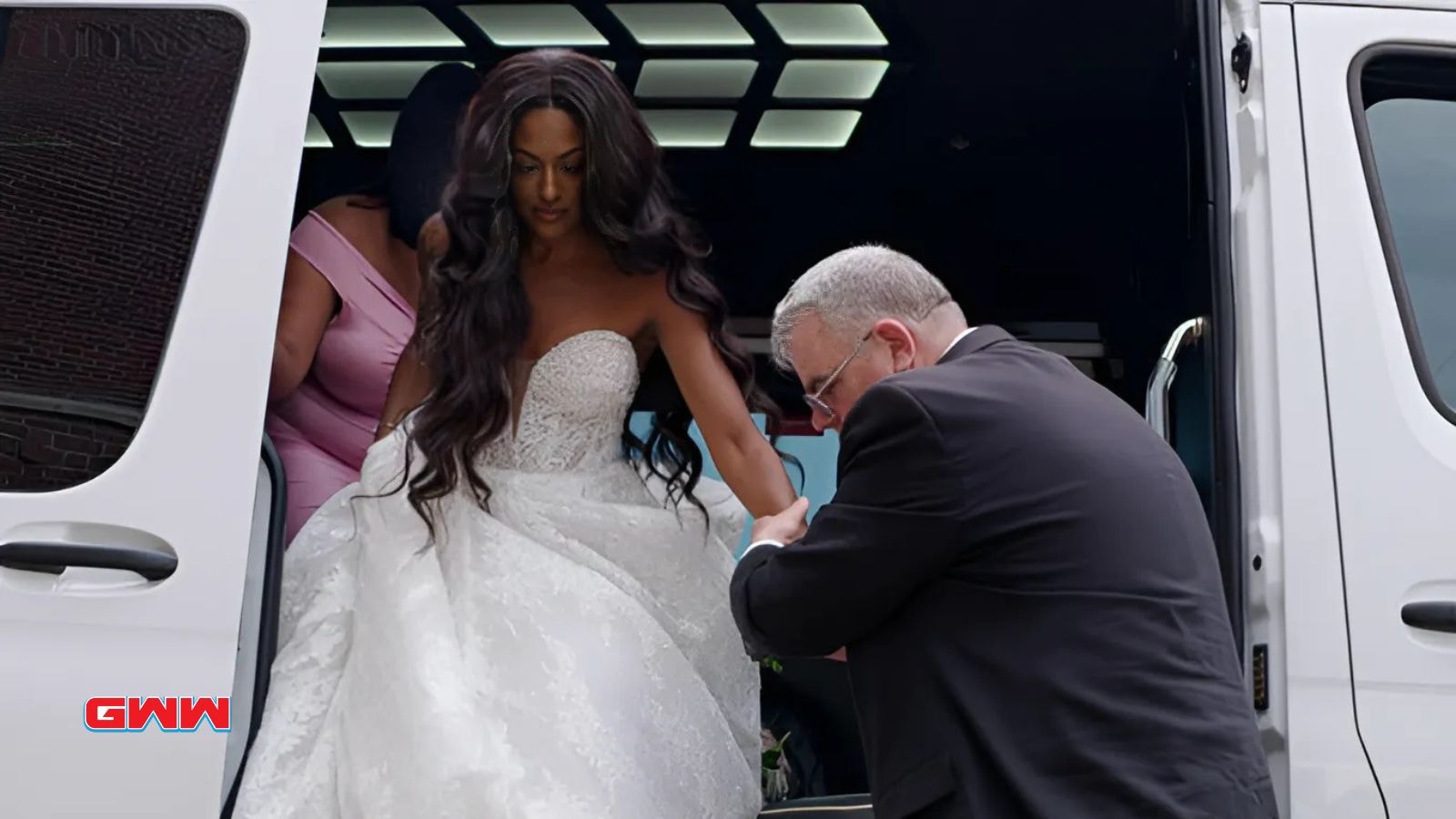 Elizabeth Bice getting out of a van with help on her wedding day