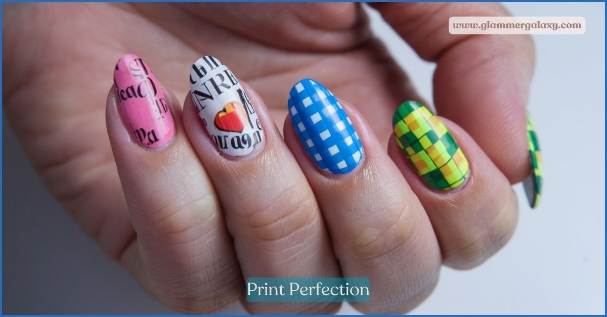 Hand with nails painted in various colorful, intricate designs